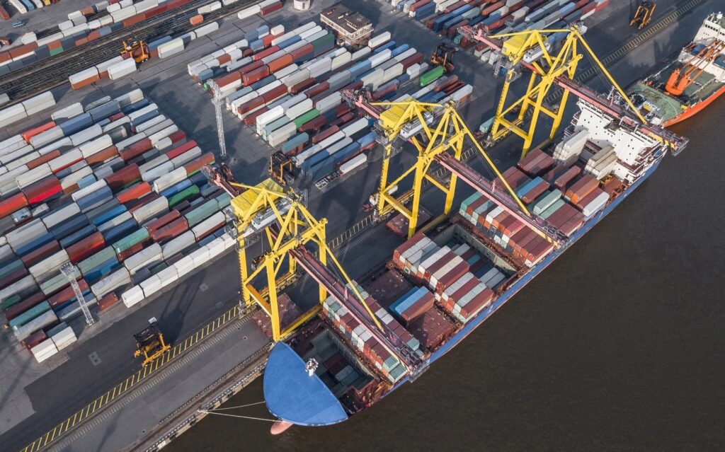 Container ship unloading in port