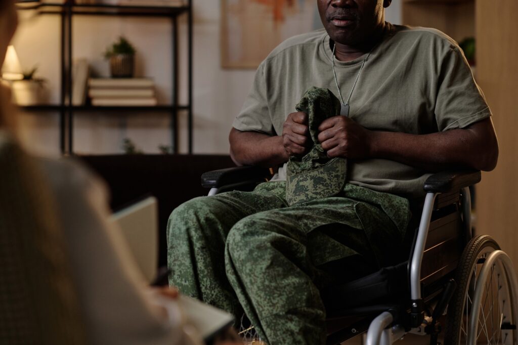 Traumatized War Veteran Having Emotional Conversation with Therapist